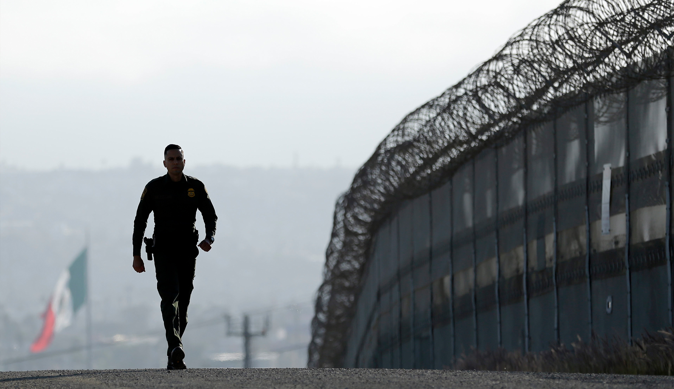 Trump busts congressional gridlock, moving wall brawl into court