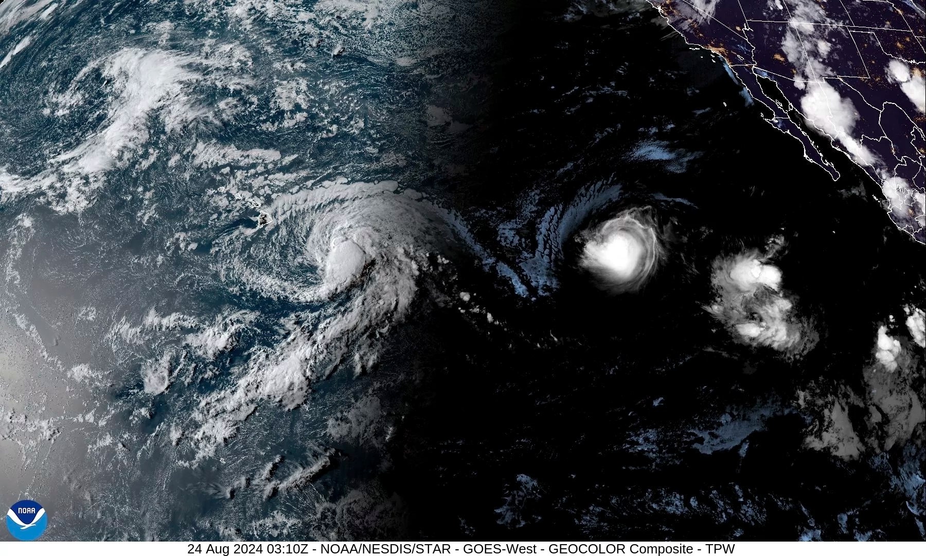 Hurricane Hone sweeps past Hawaii, dumping enough rain to ease wildfire fears