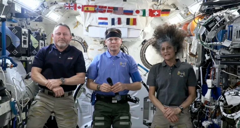 This image taken from video posted by NASA shows, from left, Butch Wilmore, Nick Hague and Suni Williams speaking during a news conference, Tuesday, March 4, 2025. (NASA via AP)