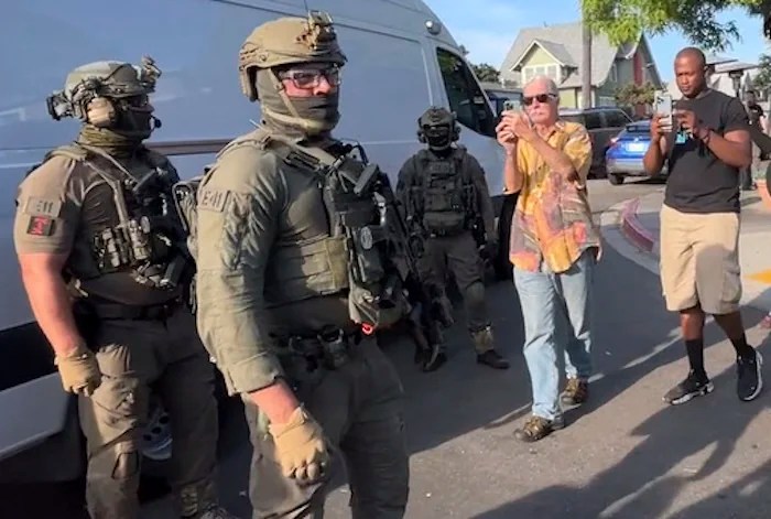 ICE agents wearing masks to arrest illegal immigrants set off political firestorm