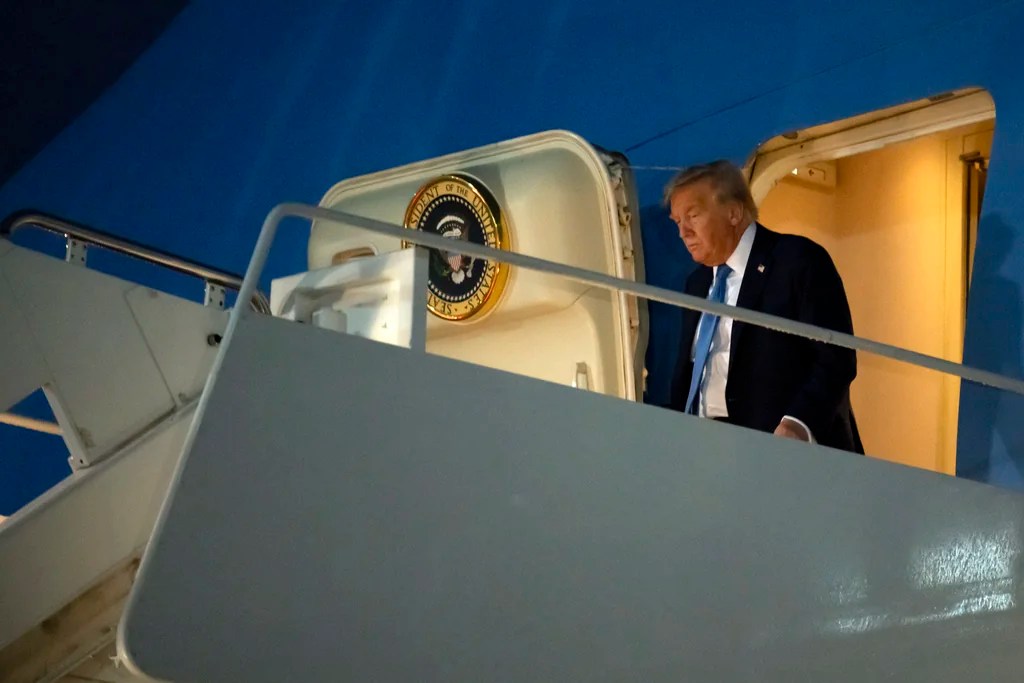 Trump warns Iran not to attack US troops upon early return to DC