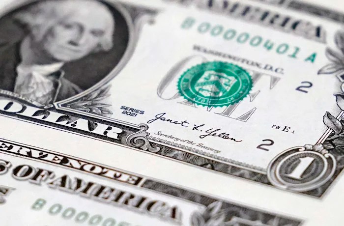 File - A newly printed U.S. dollar bill is shown at the Bureau of Engraving and Printing's Western Currency Facility in Fort Worth, Texas, on Dec. 8, 2022.